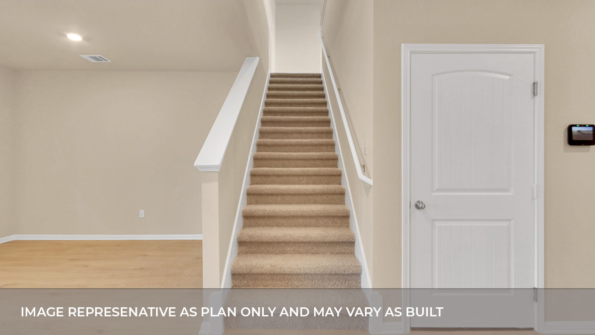 Interior staircase next to dining area