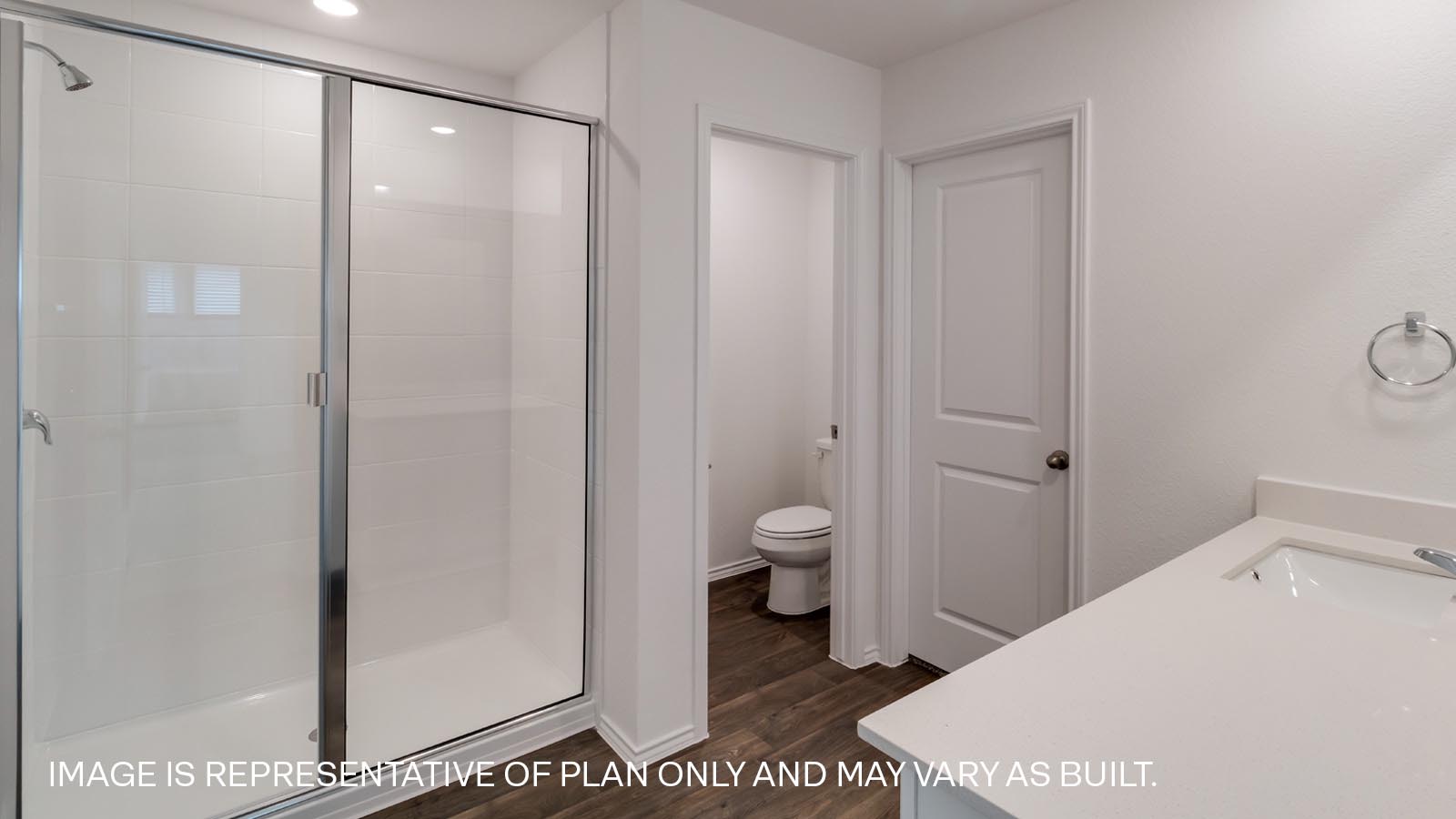 Primary bathroom with walk-in shower.