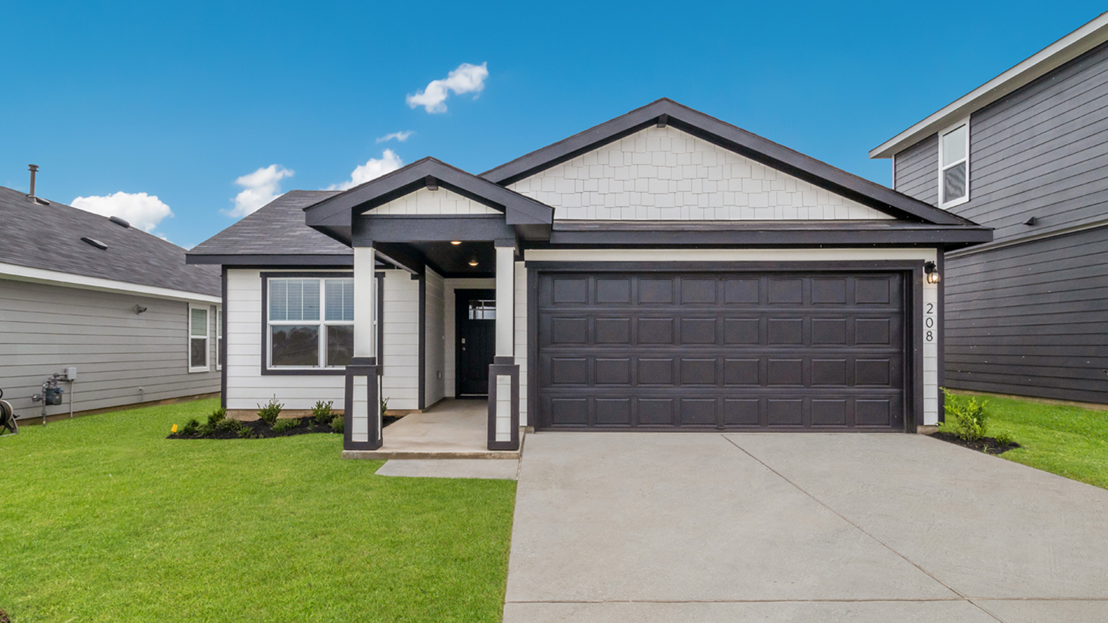 The Baxtor floorplan - H Elevation at Valverde in Bastrop, TX.