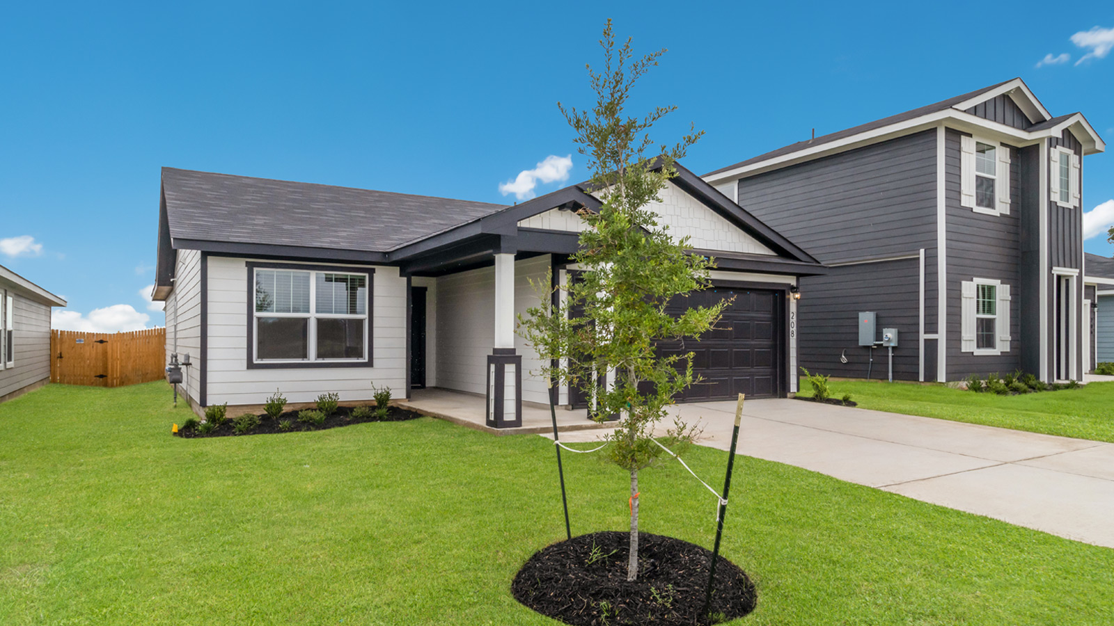 The Baxtor floorplan - H Elevation at Valverde in Bastrop, TX.