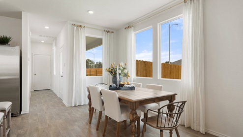 Interior kitchen with white cabinets and large central island