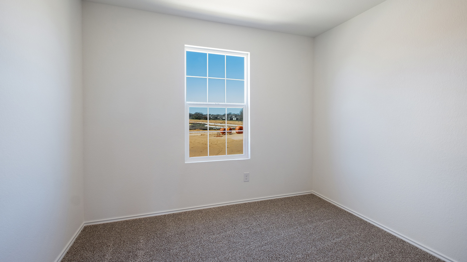 Third bedroom in Valverde includes natural window light, full closet, connectivity to the residence