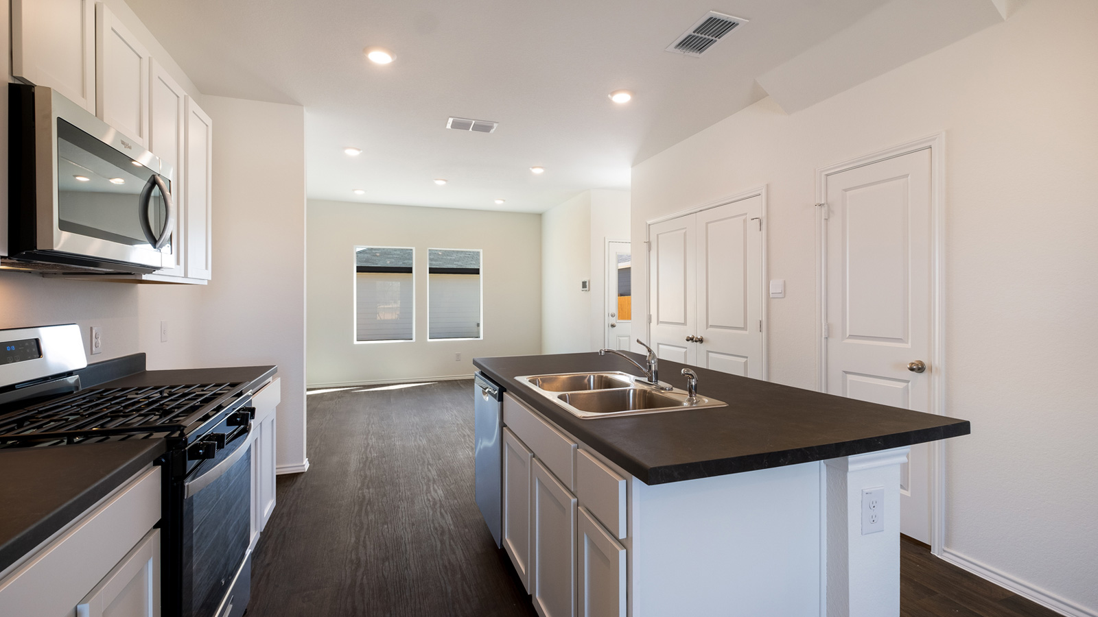 New appliances and larger kitchen island with seating anchor the kitchen, next to dining, great rooms provide stylish designs
