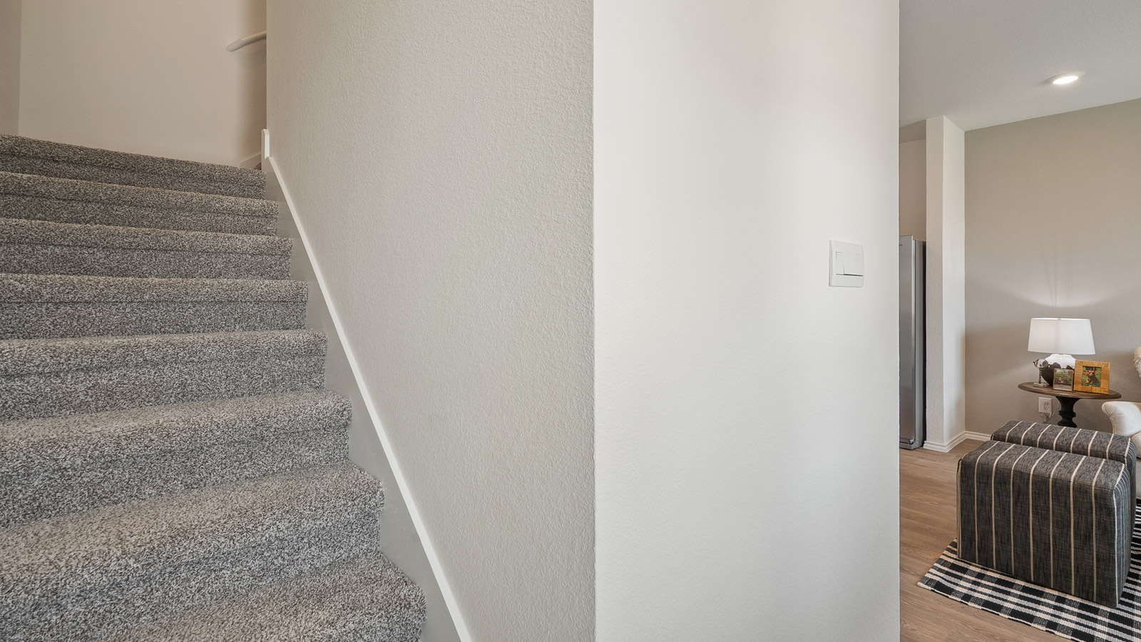 Interior stairway next to living room