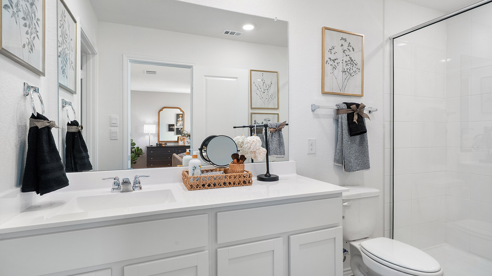 Interior bathroom with walk in shower and large vanity