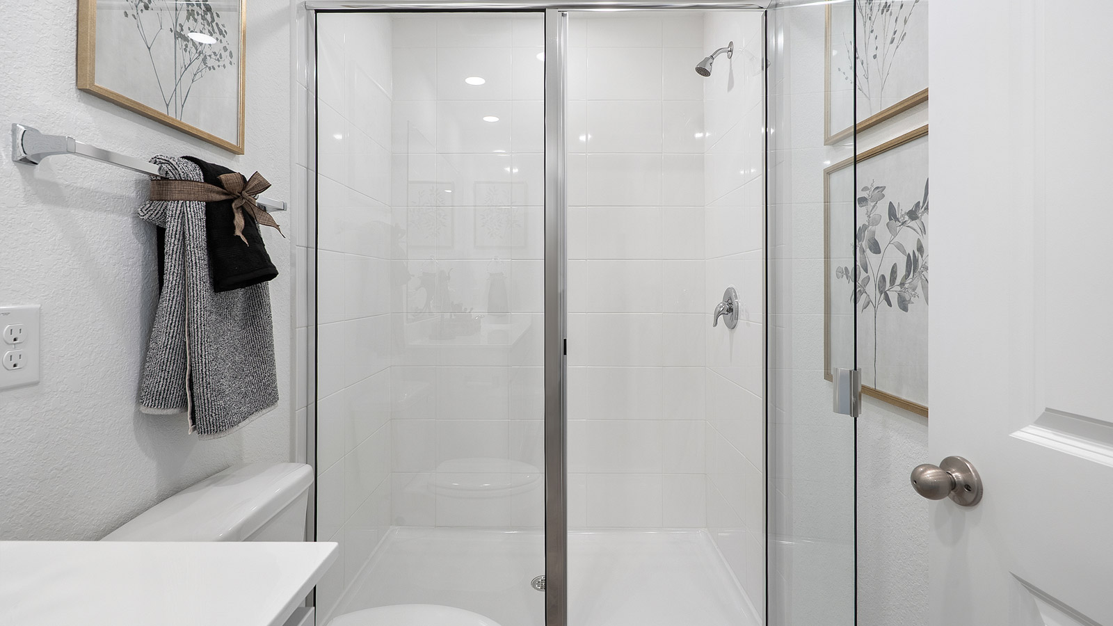 Interior bathroom with walk in shower and large vanity