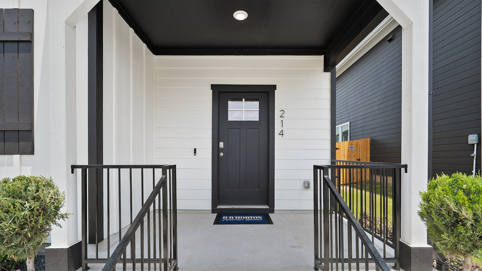 Exterior of front porch on house showing front door