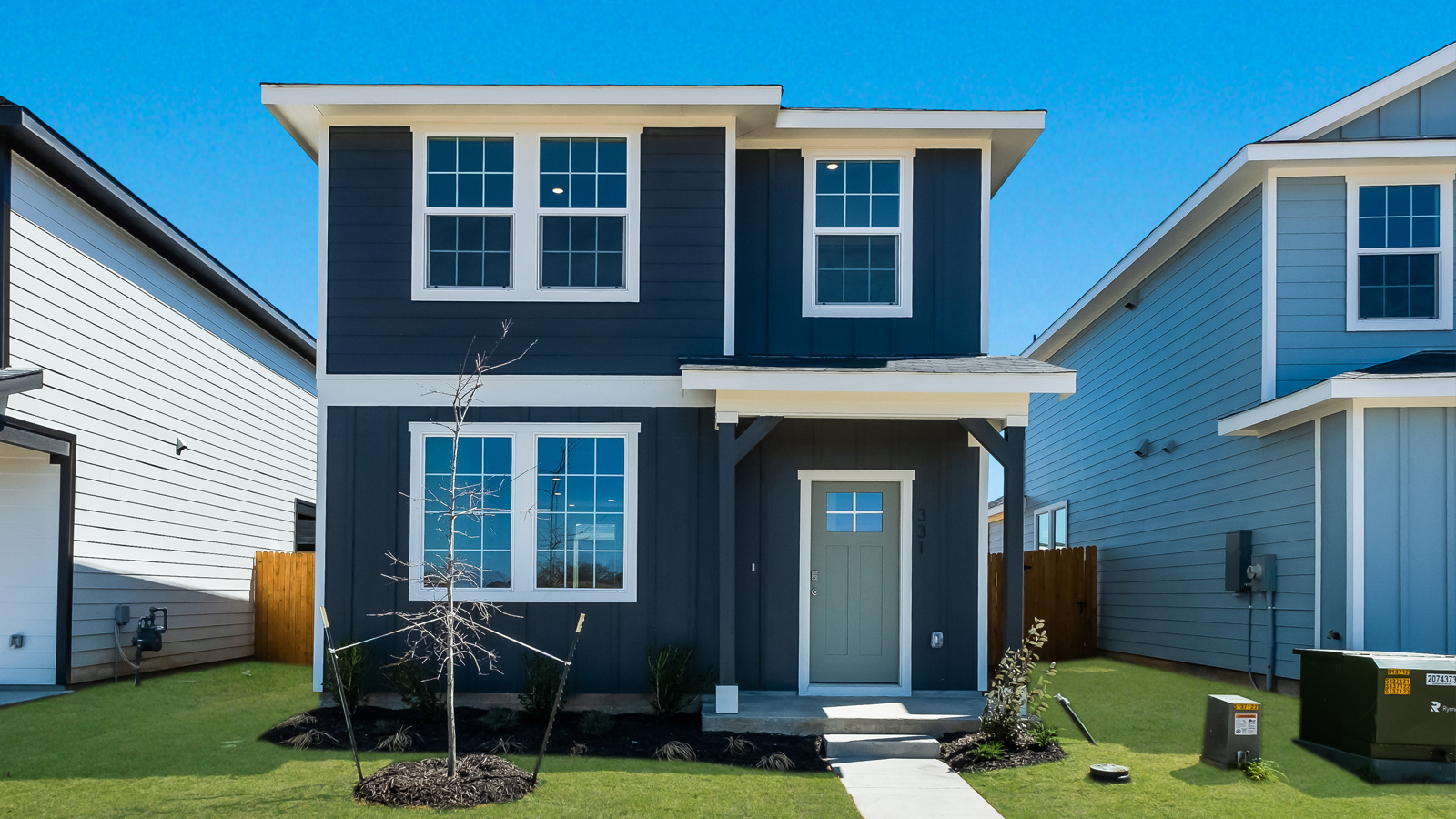 The Camille floorplan - A Elevation at Valverde in Bastrop, TX.