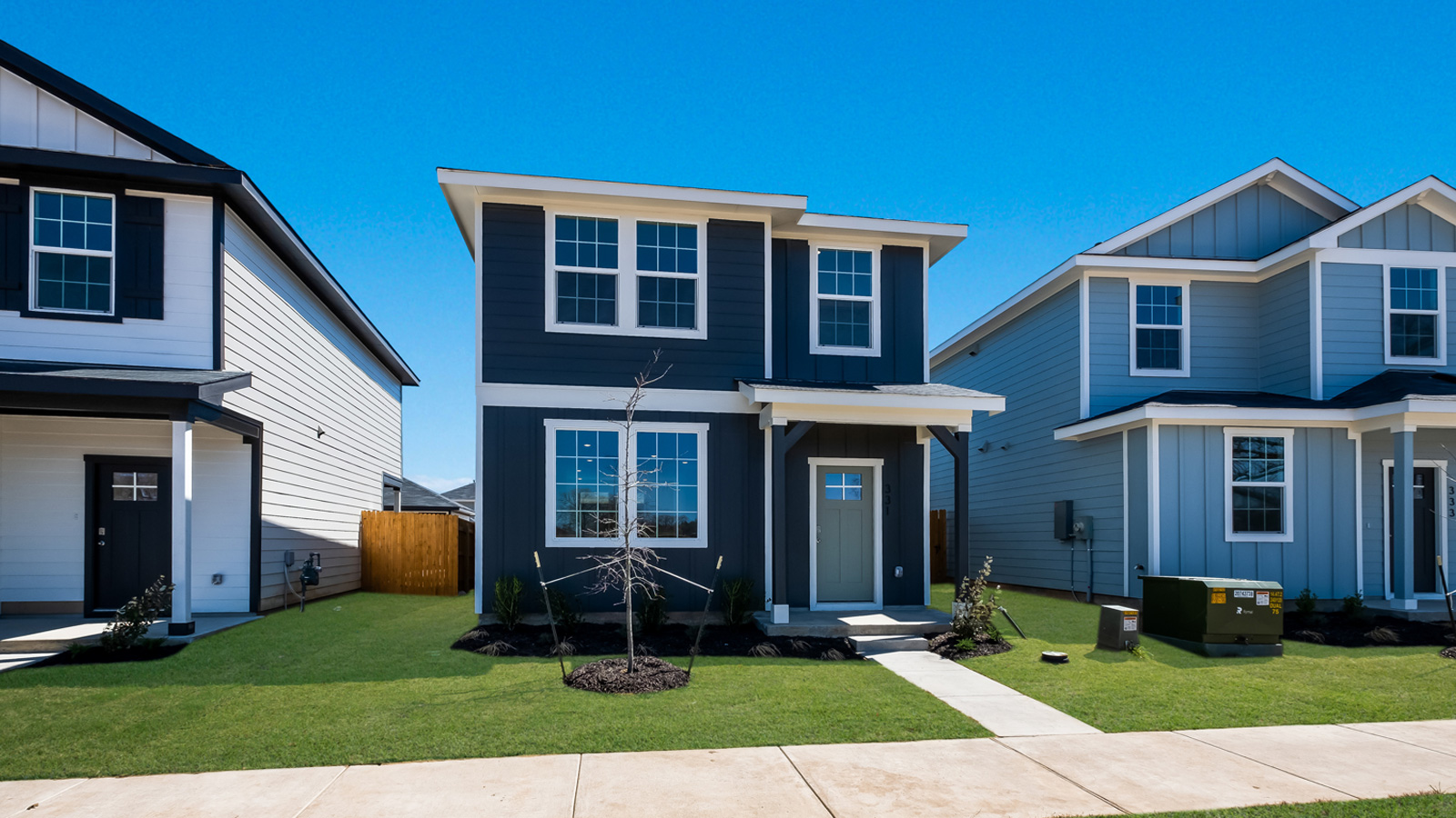 The Camille floorplan - A Elevation at Valverde in Bastrop, TX.