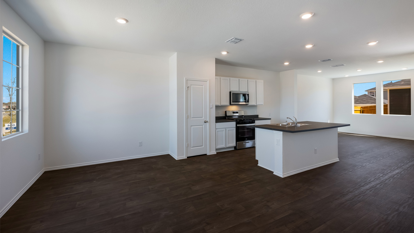 Open kitchen with stainless steel appliances..