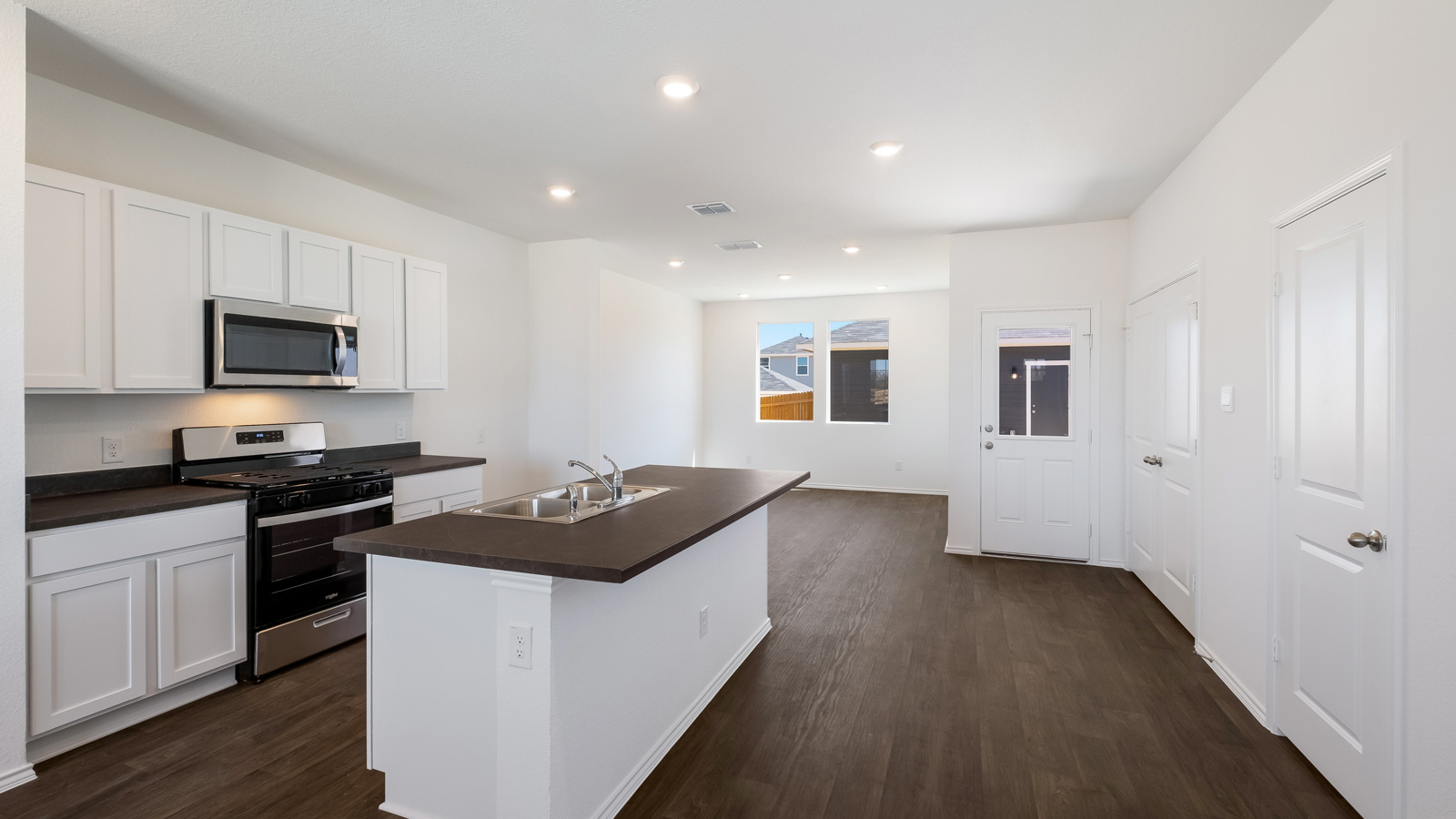 Kitchen and living room.