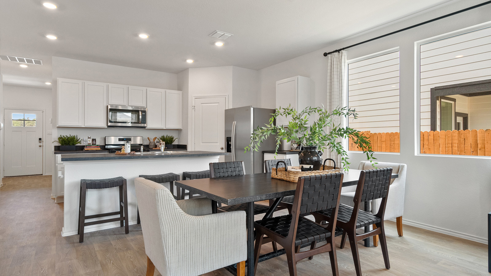 Interior of dining area open to the kitchen