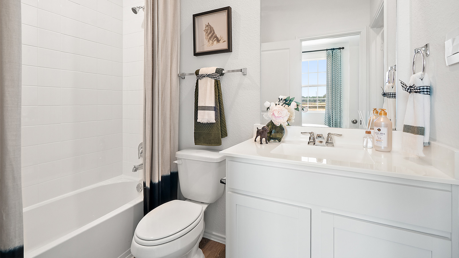 Interior bathroom with full sized shower vanity