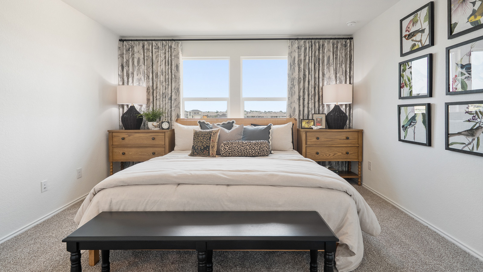 Interior of bedroom with large windows