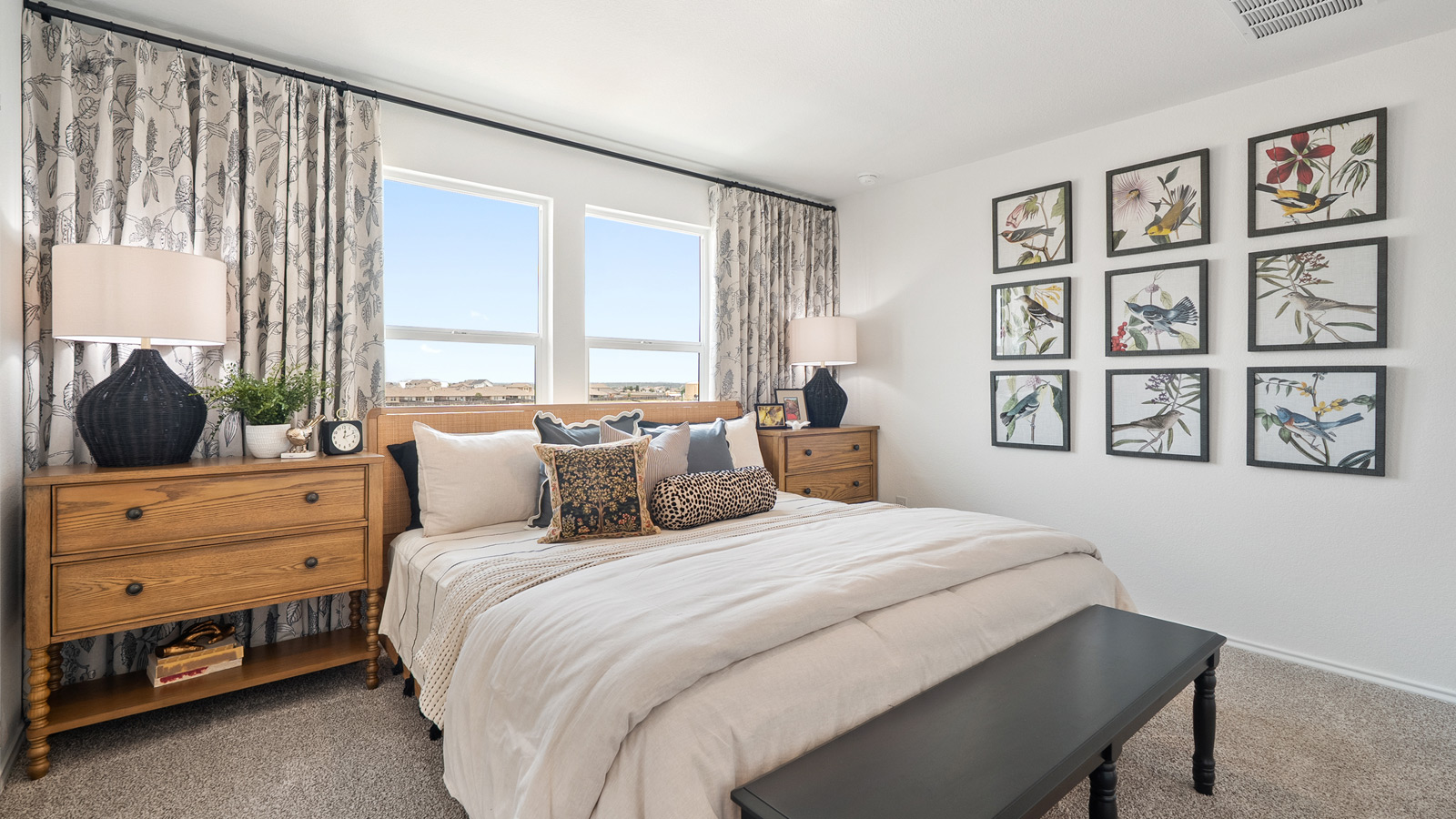 Interior of bedroom with large windows