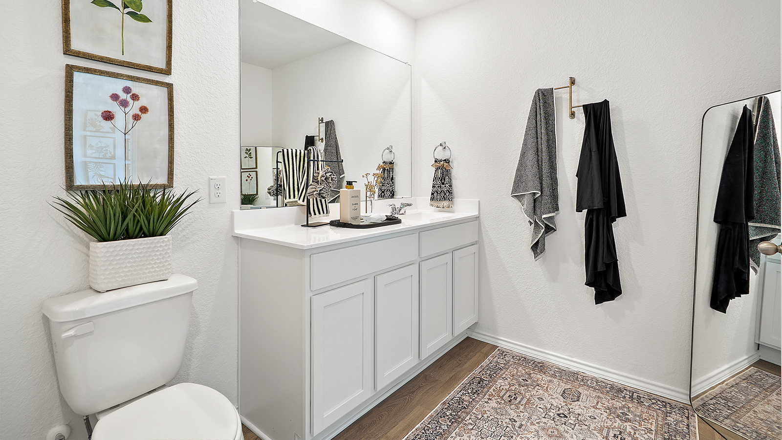 Interior bathroom with walk in shower and large vanity