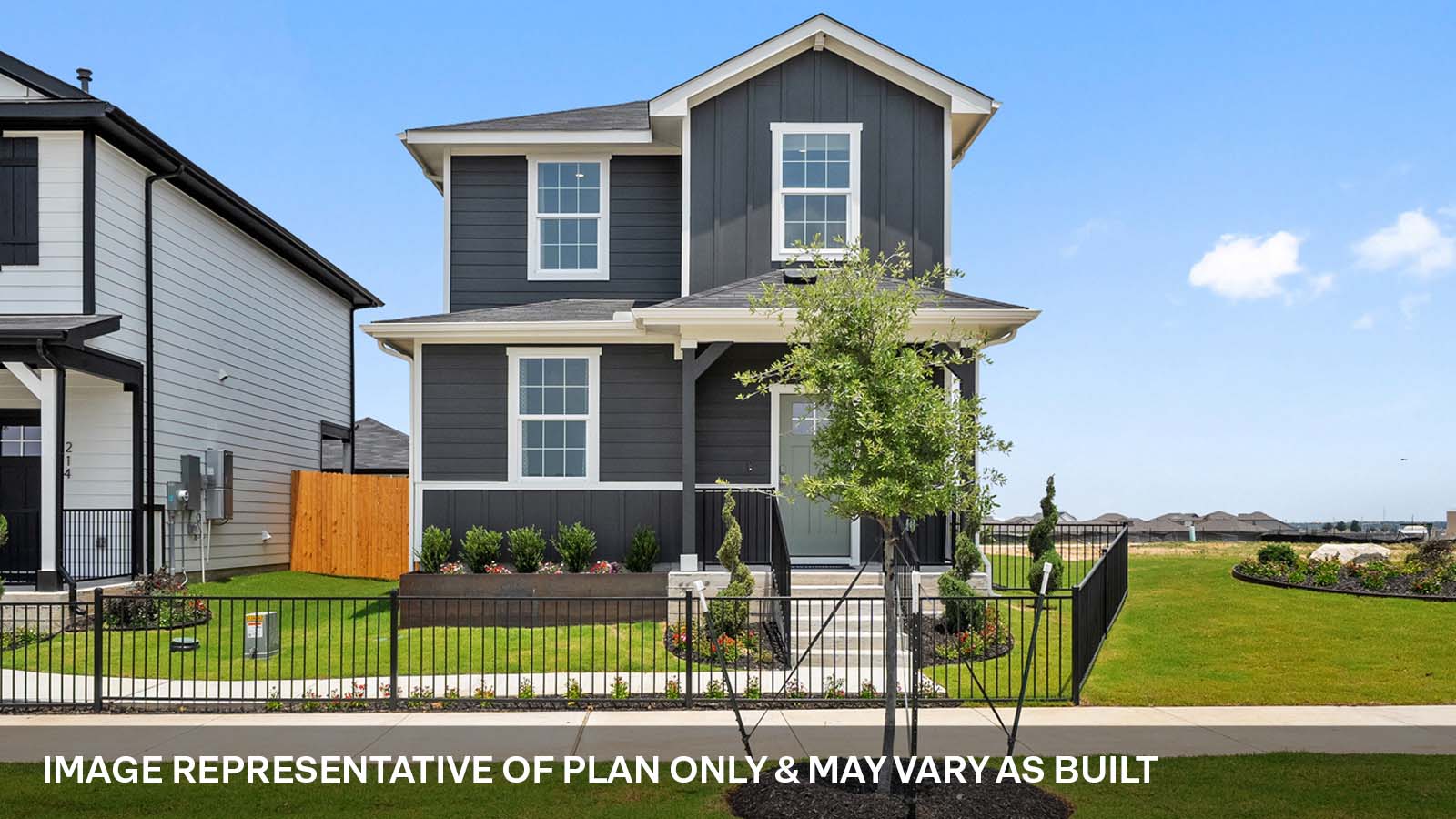 Exterior of two story home with grey wood cladding
