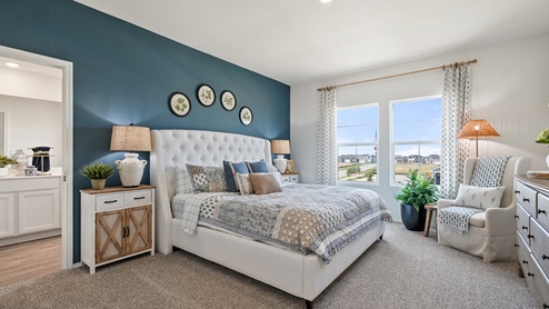 Interior bedroom with two large windows
