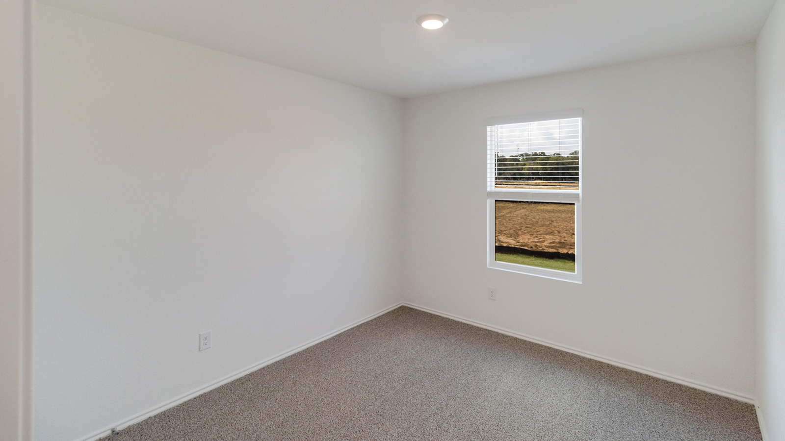 Bedroom 2 with carpeted flooring,
