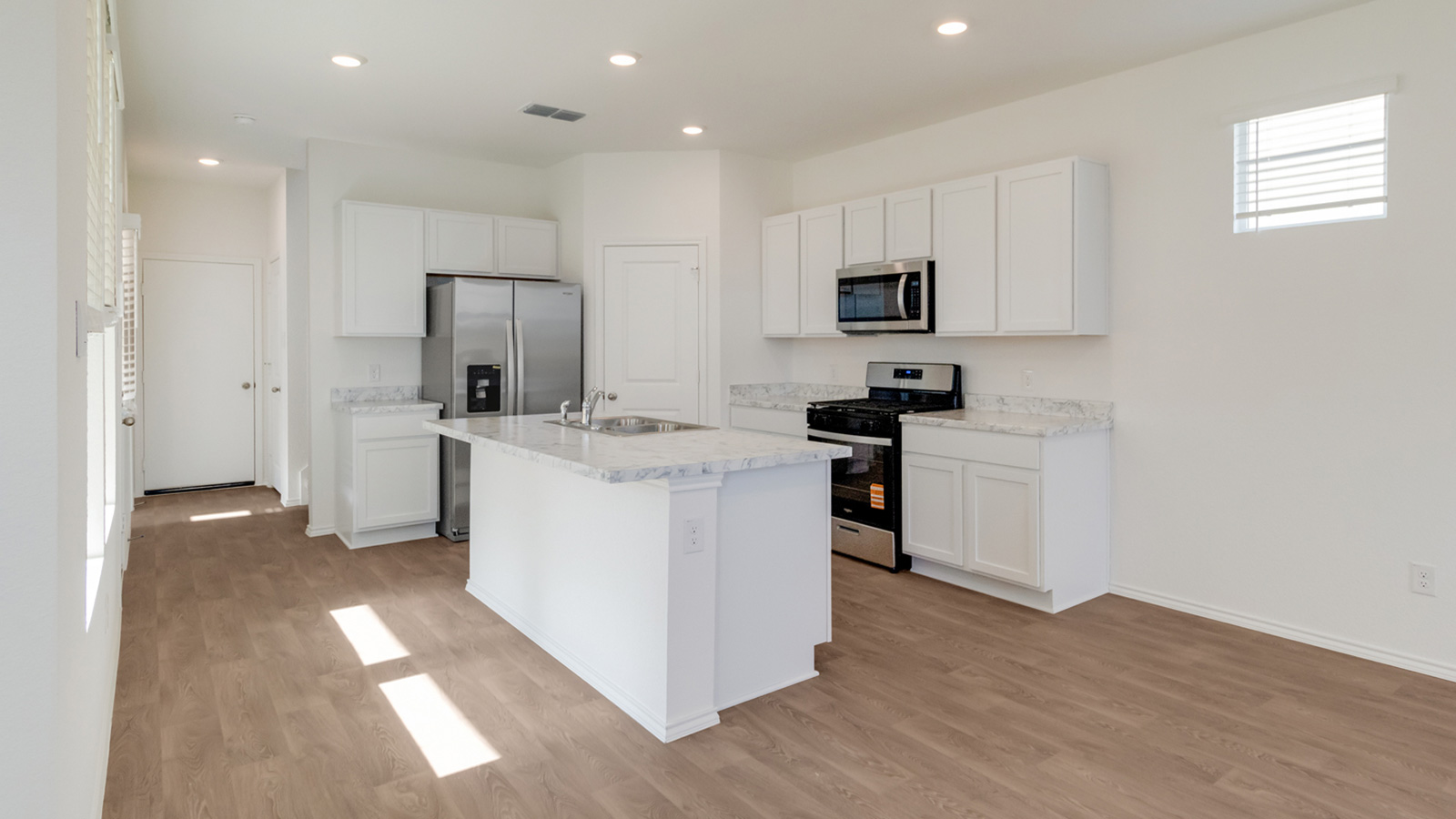 Gourmet kitchen with stainless steel appliances.