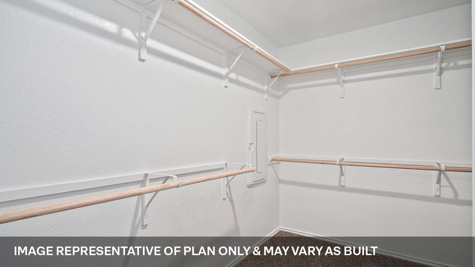 Walk-in closet in primary bathroom.