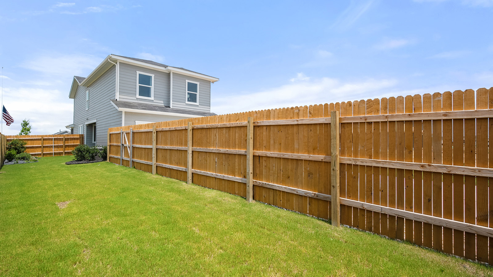 Exterior backyard showing yard and fence