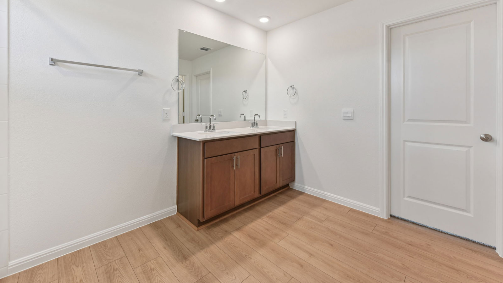 Luxurious primary bathroom with walk-in shower.