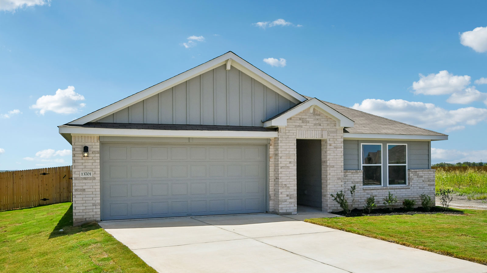 The Justin Floorplan- I elevation at Carillon in Manor, Tx