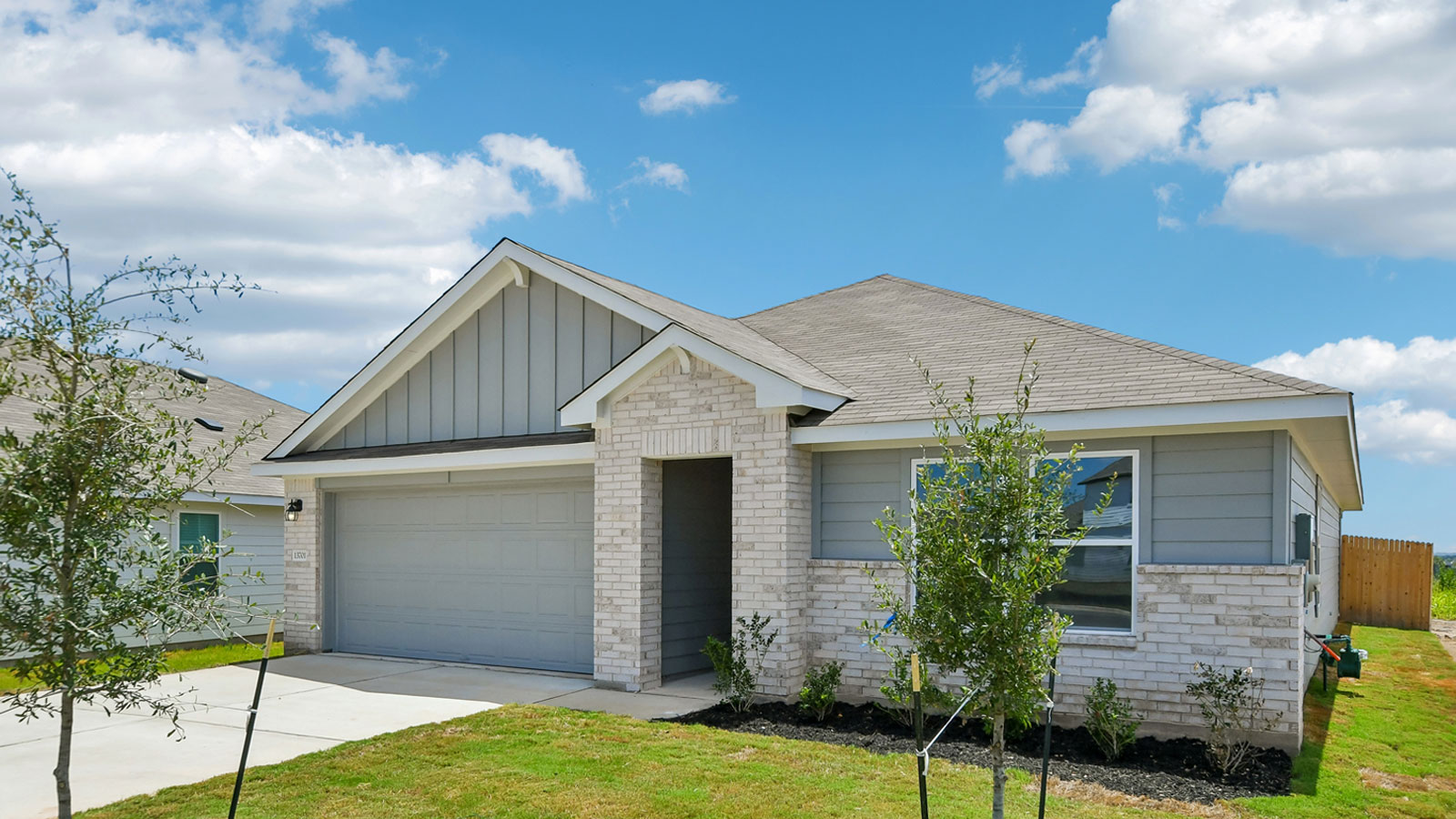The Justin Floorplan- I elevation at Carillon in Manor, Tx
