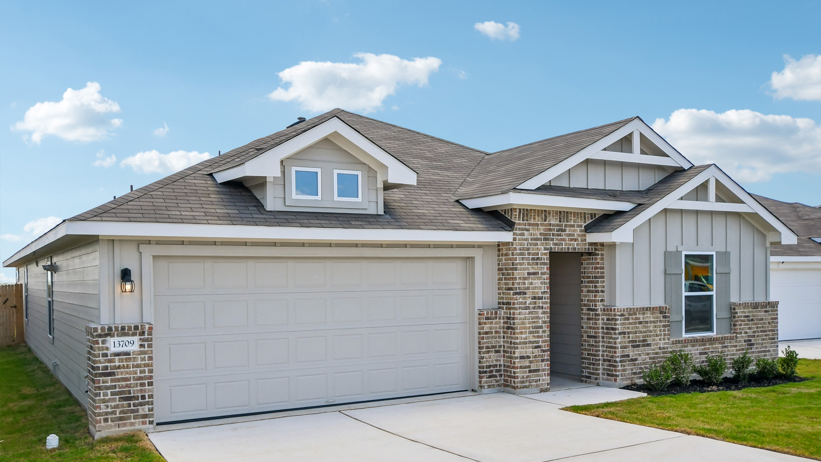 The Lakeway floorplan-H Elevation at Carillon in Manor, TX