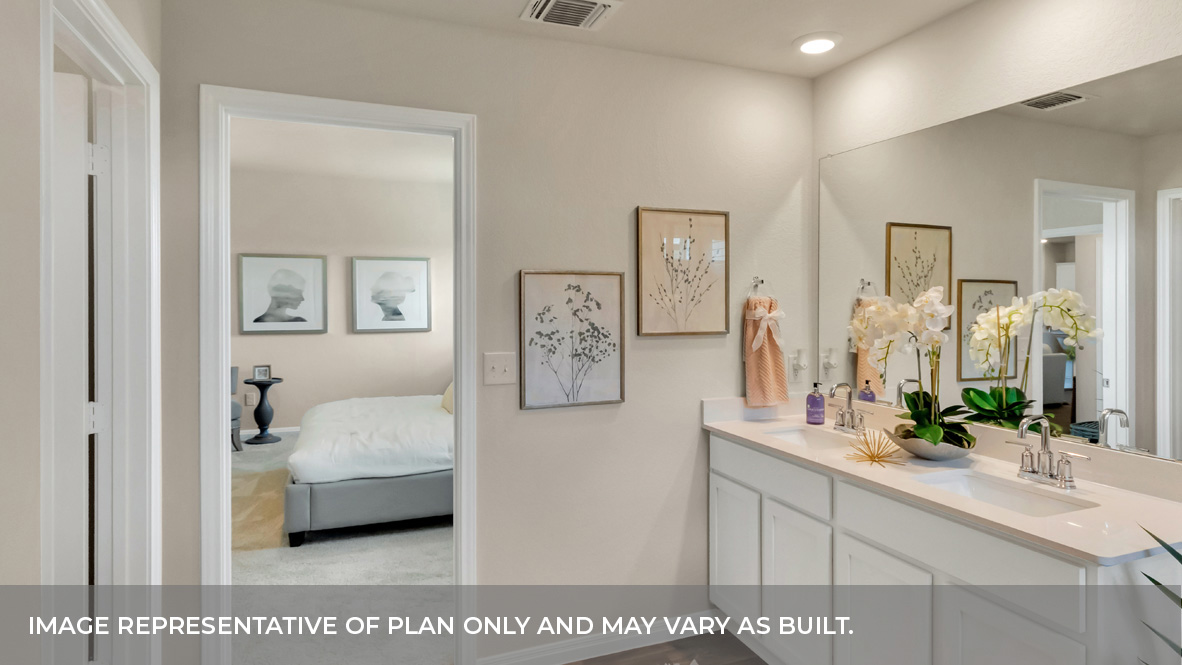 Primary bathroom with vanity sink.
