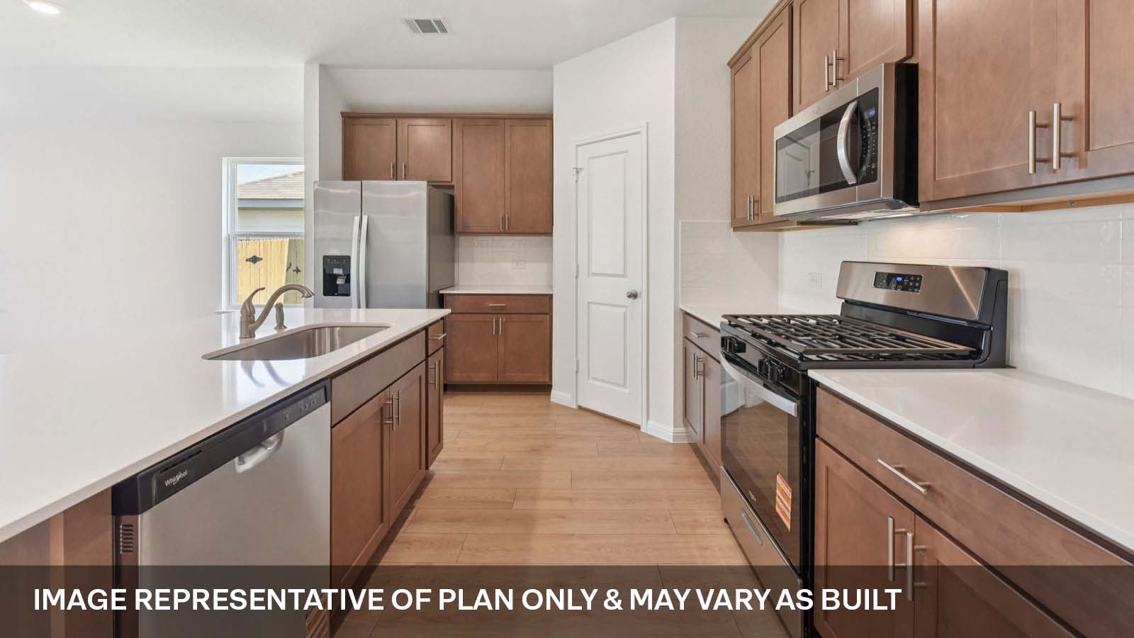 Kitchen island with dishwasher.