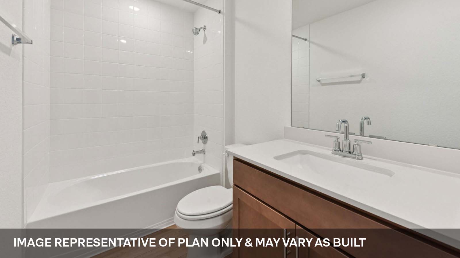 Secondary bathroom with tub and raised shower head.