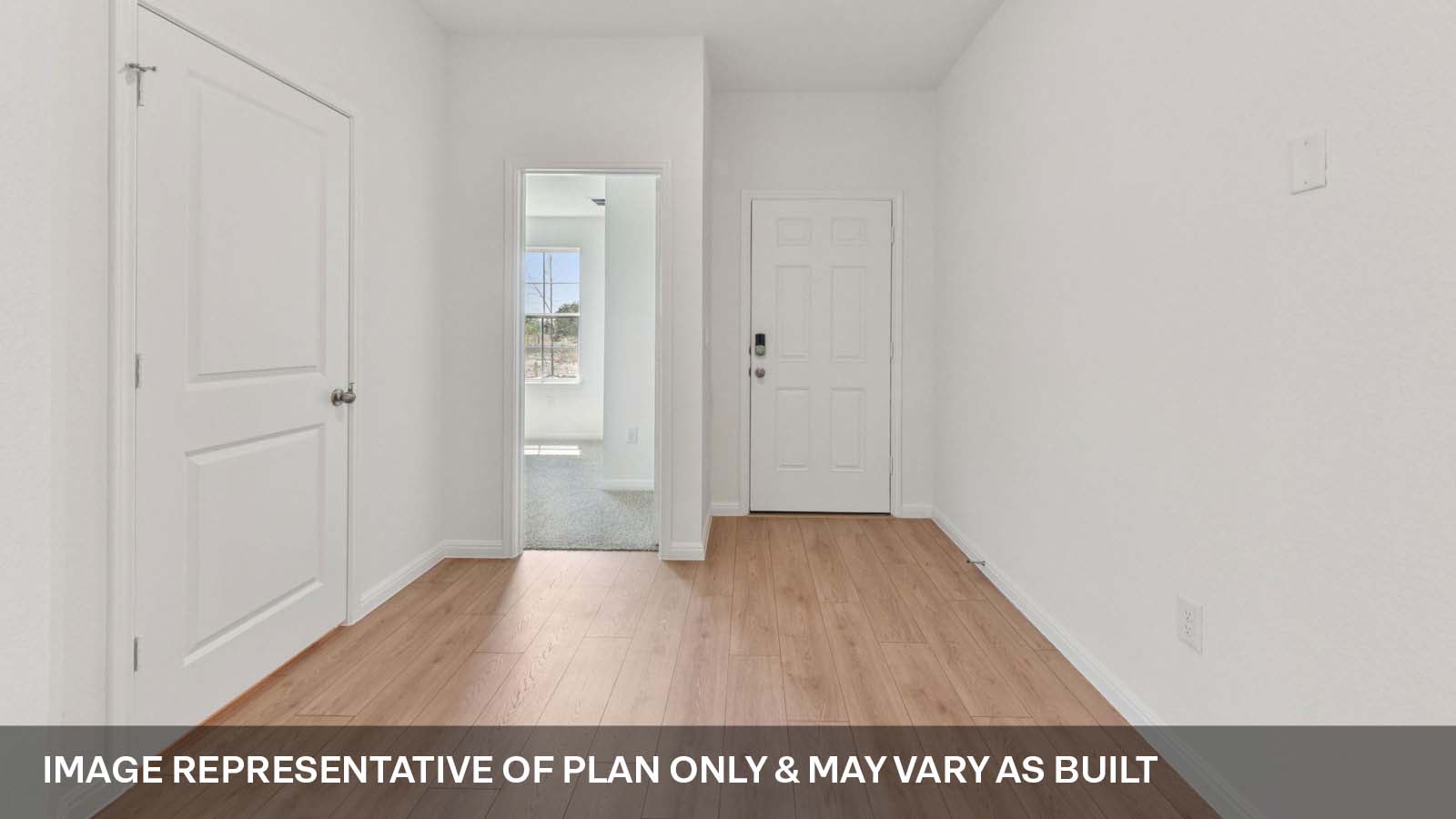 Entryway with premium laminate wood plank flooring.