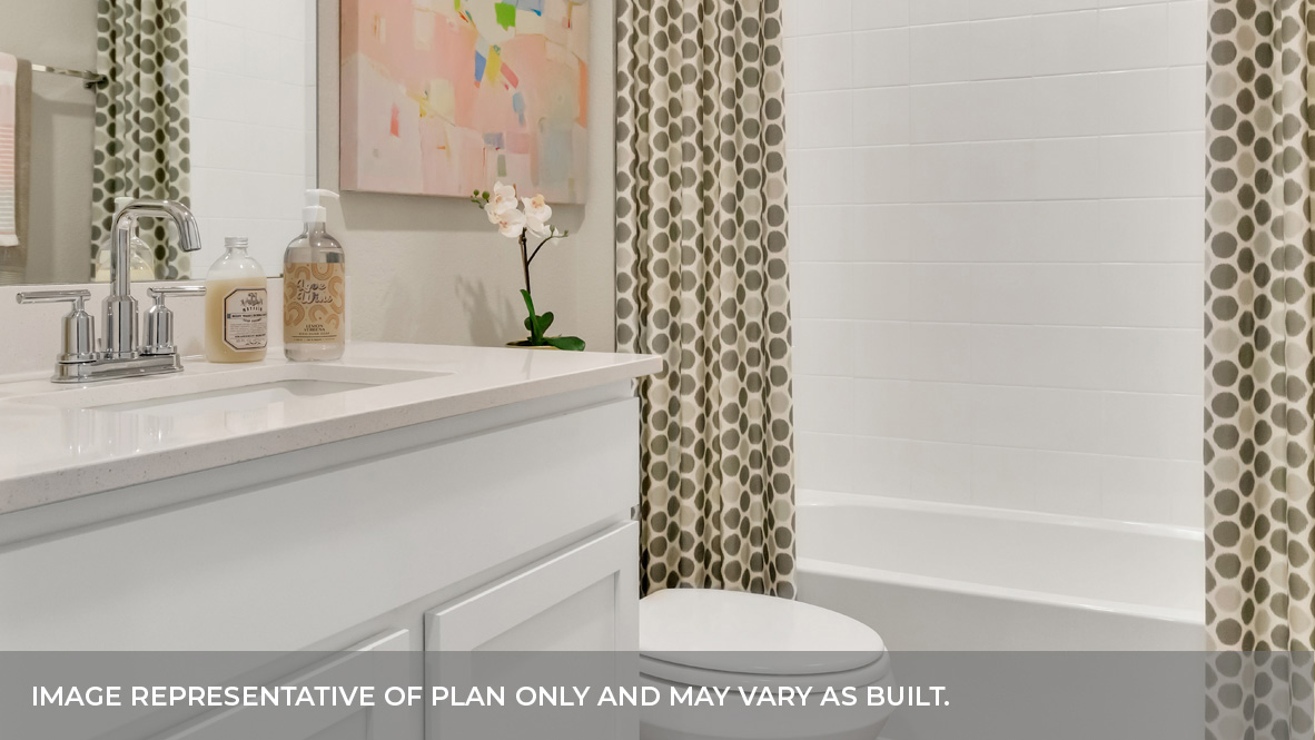 Second bathroom with tub.