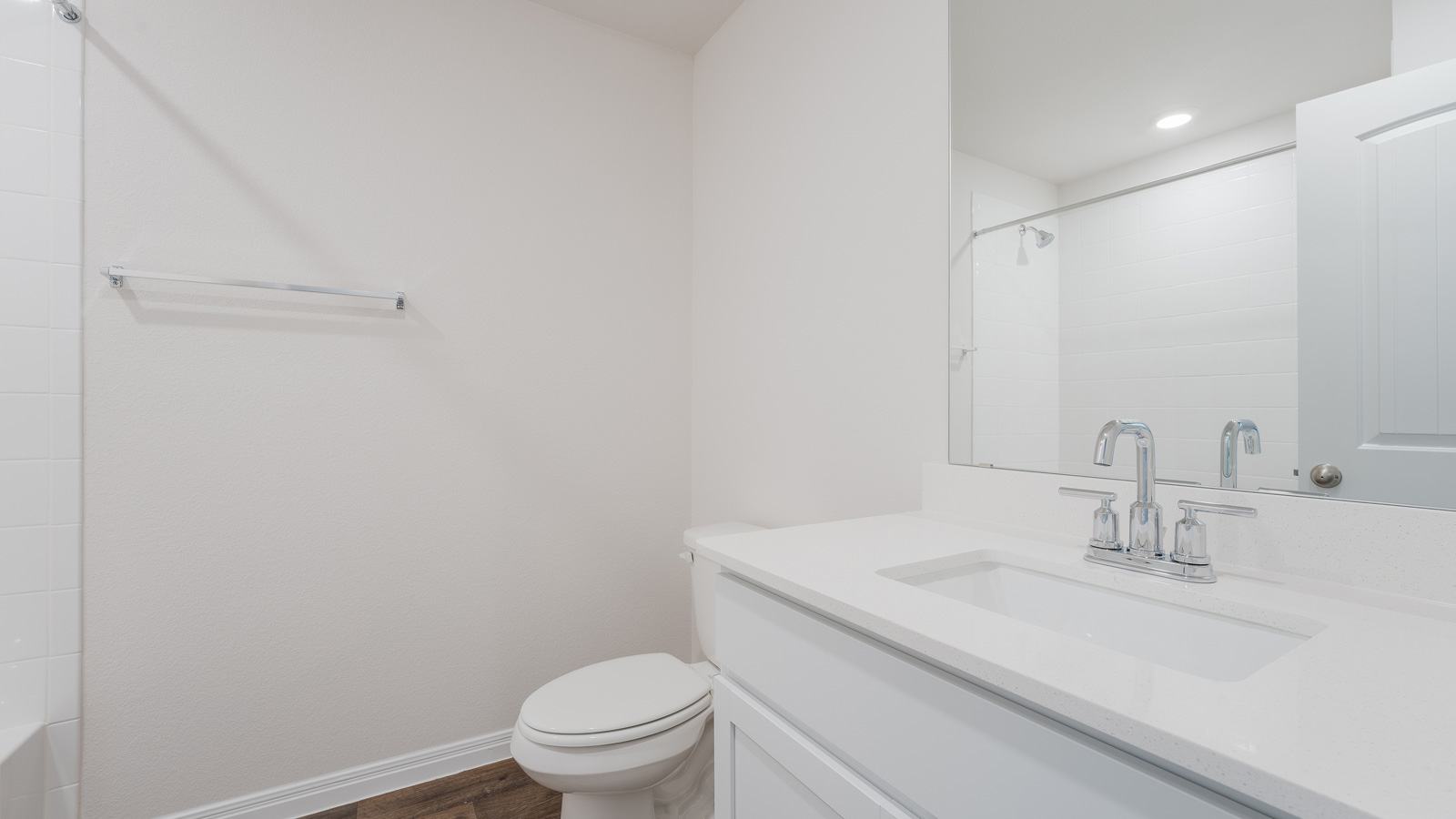 Bathroom 2 with single vanity sink and tub.