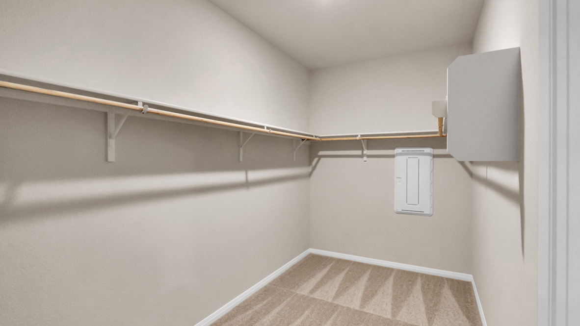 New home primary walk-in closet adds crafty organized space designed by D.R. Horton in Carillon