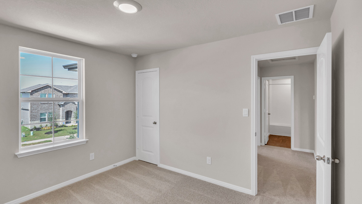 Secondary bedroom with full closet, direct access to shared upstairs spaces, loft multi-use areas Carillon