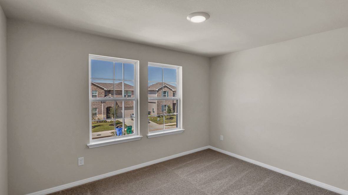 Multi-use bedroom, flex, office, study, craft, entertainment game room in D.R. Horton's new stylish construction home