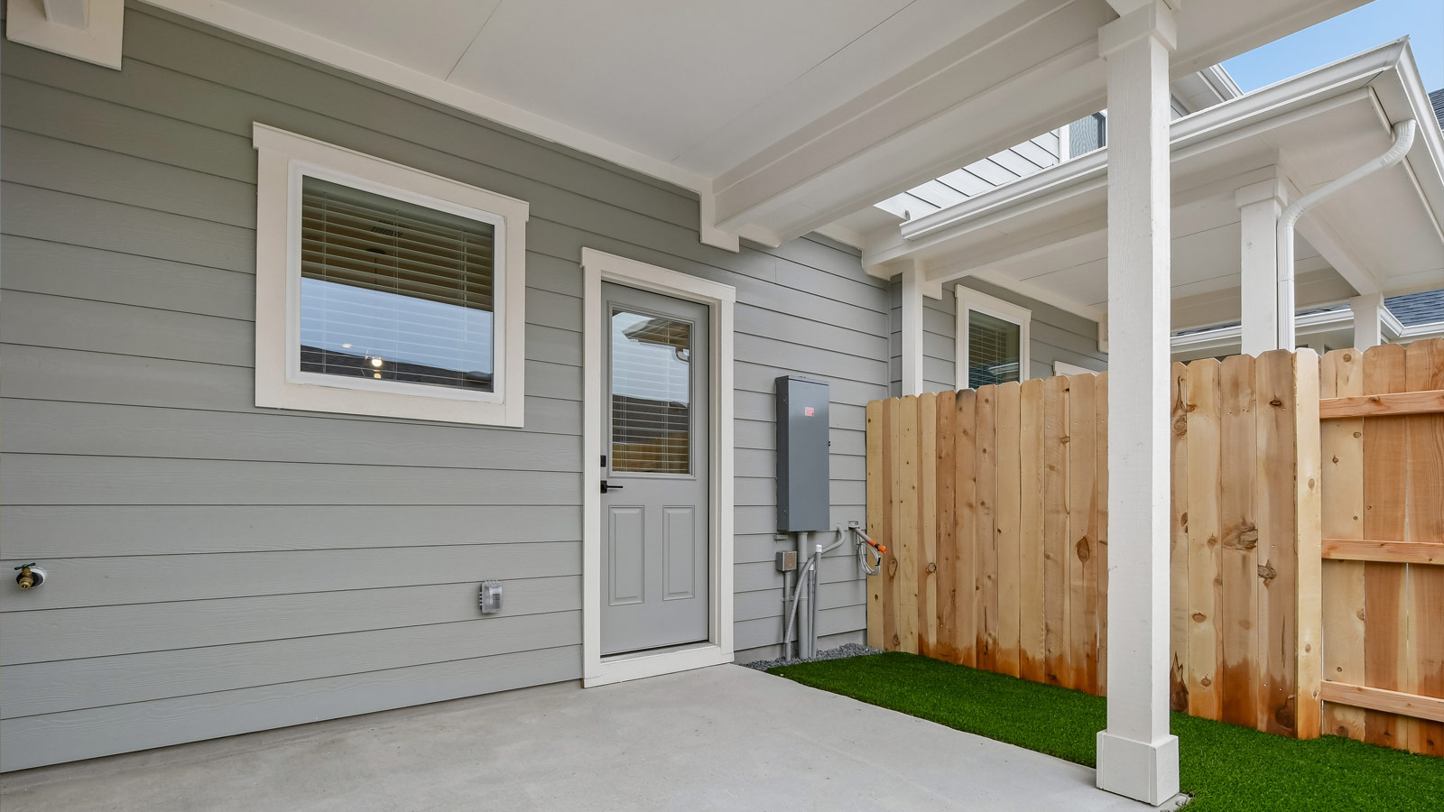 Covered back patio of 2530 Violet Theo Lane.