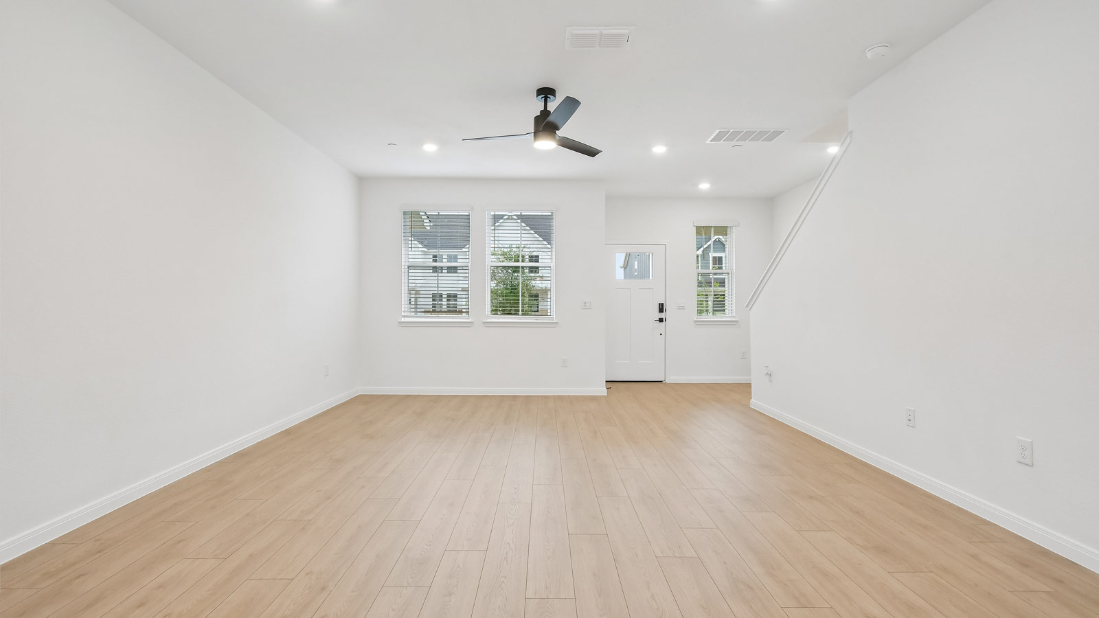 Living aera with premium laminate wood plank flooring.