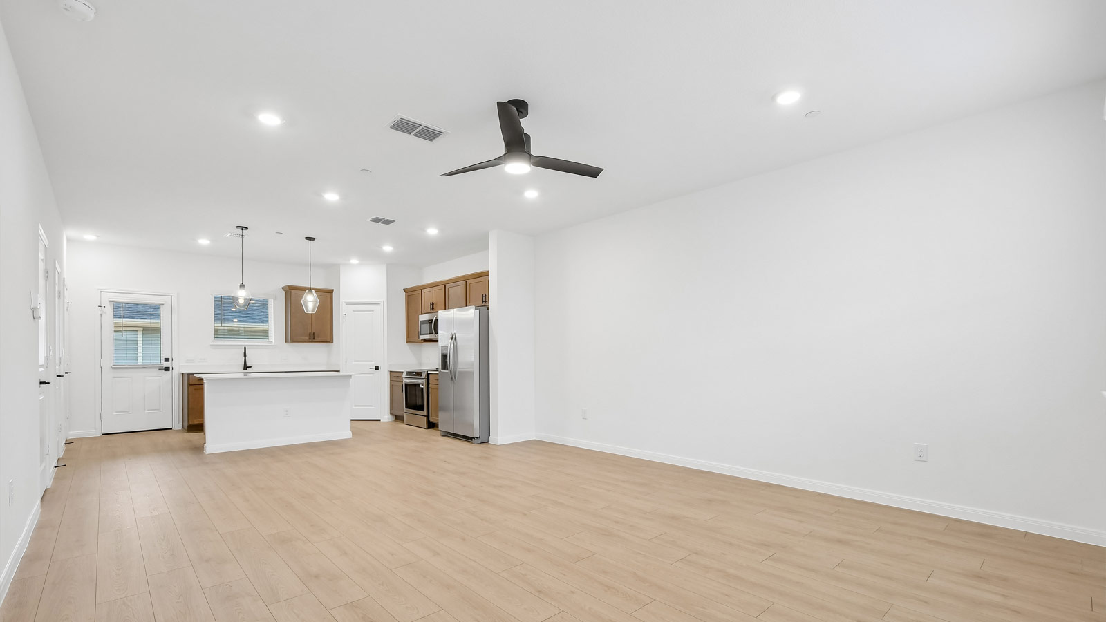 Living aera with premium laminate wood plank flooring.