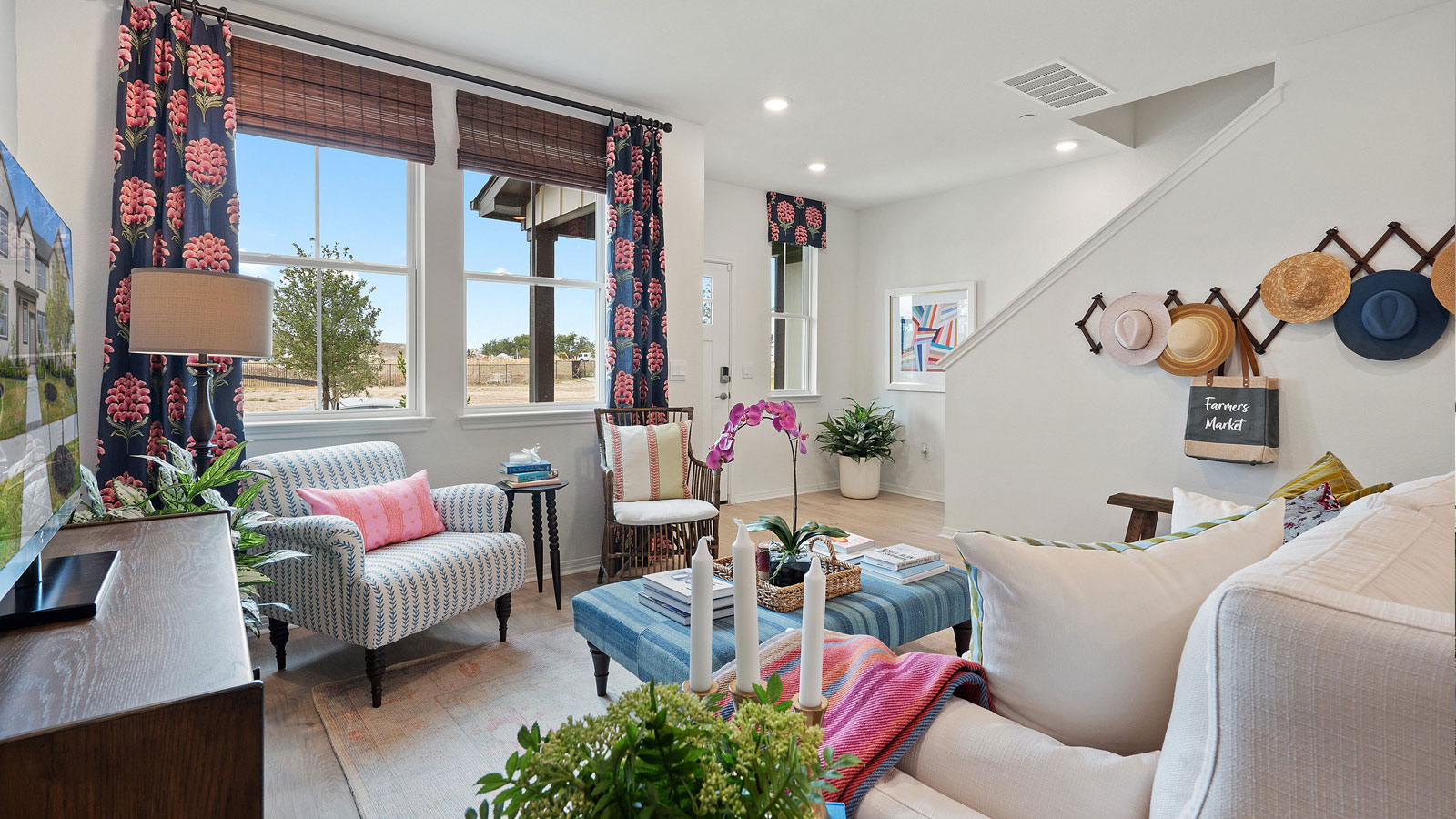 Open living space with two windows.