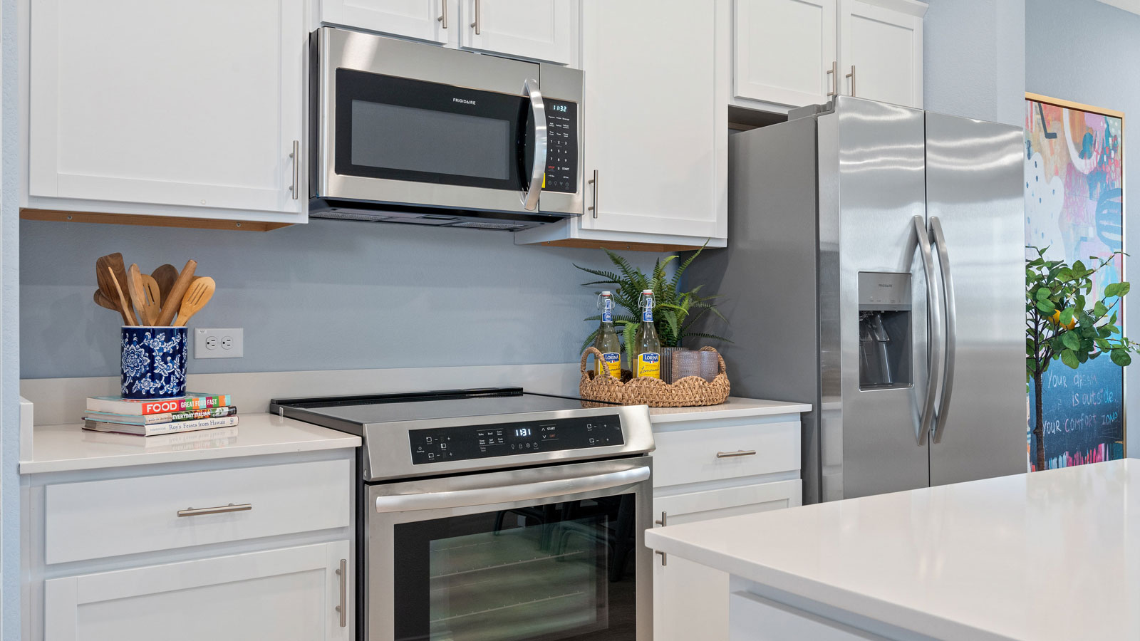 White cabinets in kitchen.