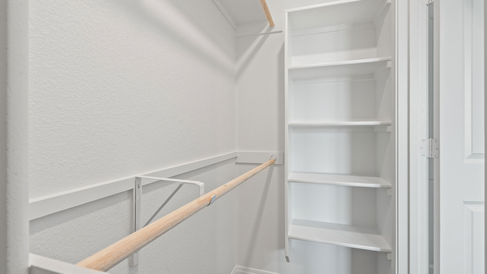 Open closet with shelves.