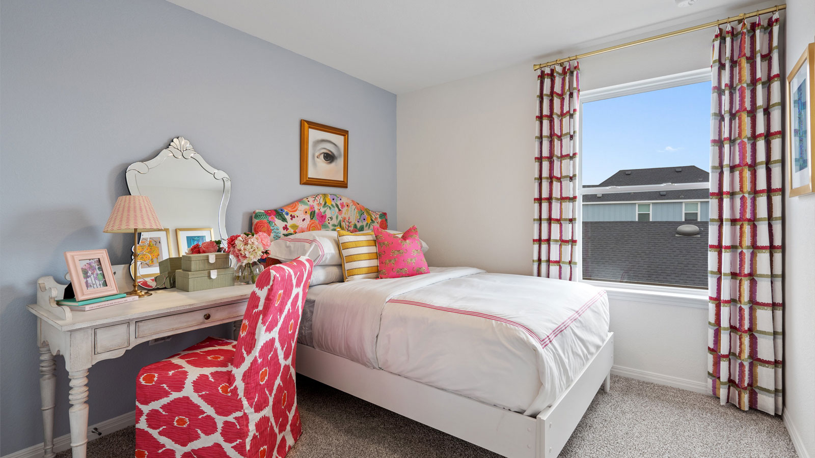 Second bedroom with large window.