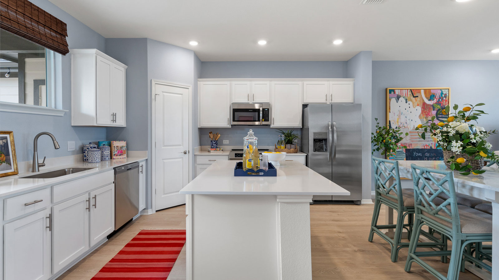 Gourmet kitchen with stainless steel appliances.