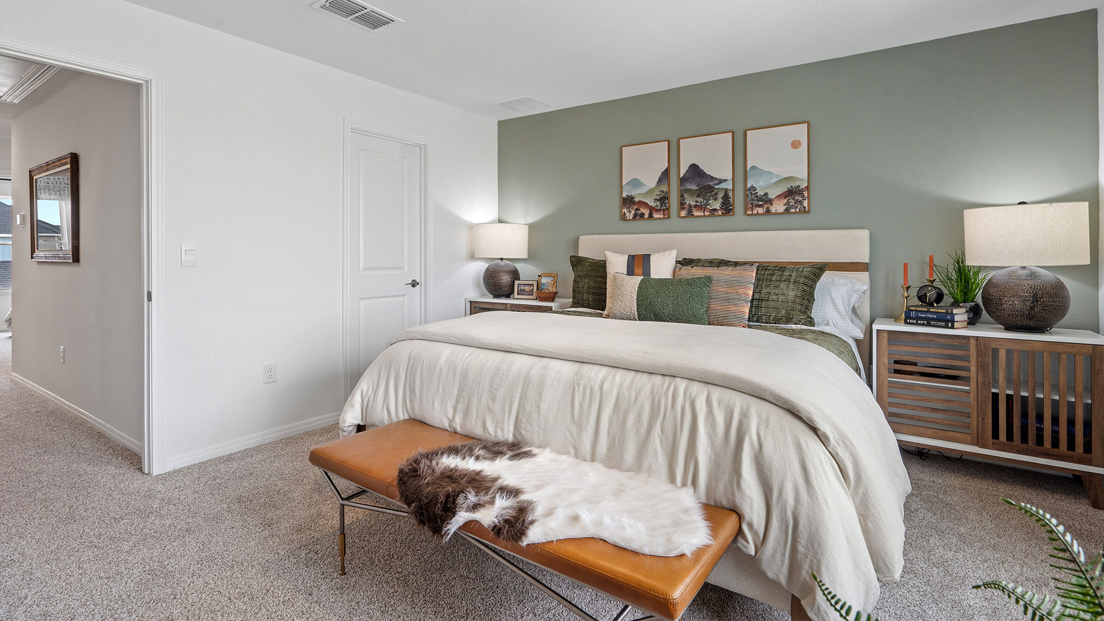 Primary bedroom designed for privacy and style adding a spa-inspired ensuite bathroom, walk-in closet, storage