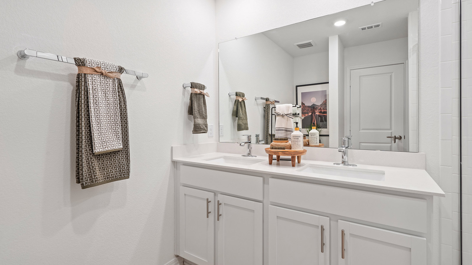 Owner’s ensuite adds a spa-inspired ensuite, walk-in shower, double vanity designed for functional privacy