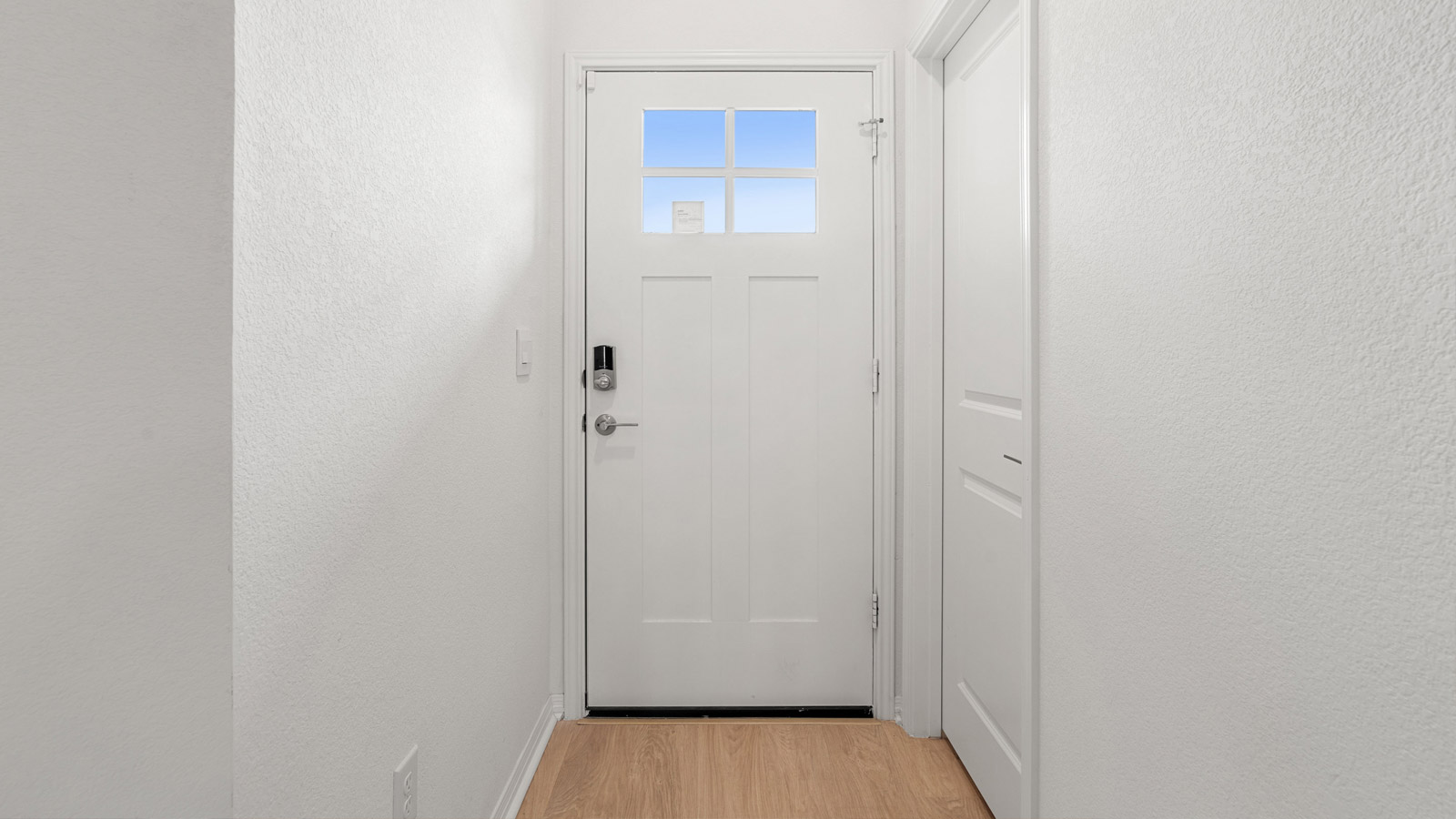 Front Door view from the foyer, entry hall inside front door, near office, or flex room adding a direct line of sight to home